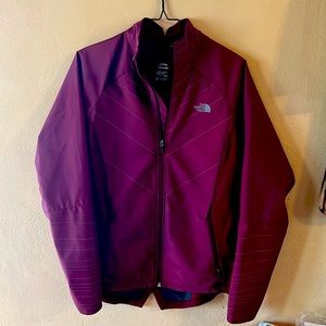 Barely work Burgundy North Face rain jacket. Very slimming on.